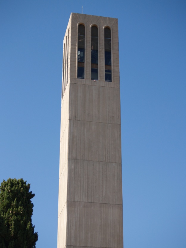 Awfully reminiscent of the UC Berkeley bell tower (the Campanile), yet so different. I called this one the Bionic Eye because it has red lights on the top.